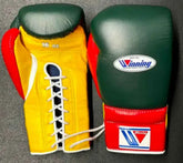 Custom Winning professional 16oz lace-up boxing gloves featuring a dark green leather face, a vibrant yellow palm with a white lace channel, and a red thumb and cuff block.