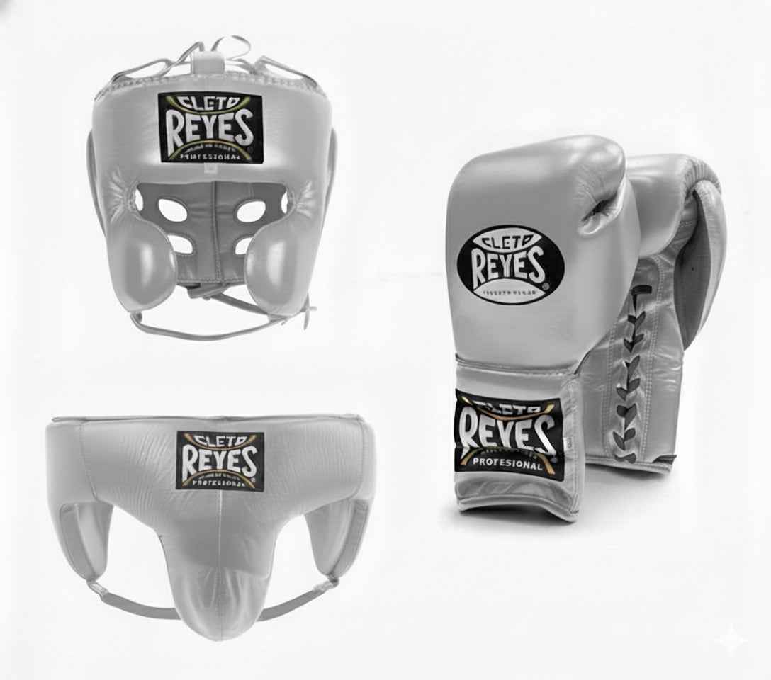 Official Cleto Reyes professional 3-piece boxing sparring gear set featuring matching lace-up gloves, a cheek protector headguard, and a groinguard in uniform metallic silver leather.