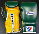 Custom Winning professional 16 oz lace-up training boxing gloves in a forest green, metallic gold, and black premium leather tricolor layout with white laces and white edge piping.