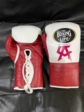 No Boxing No Life professional lace-up boxing gloves in white and red leather featuring the official brand patch and a pink Canelo Alvarez CA logo.