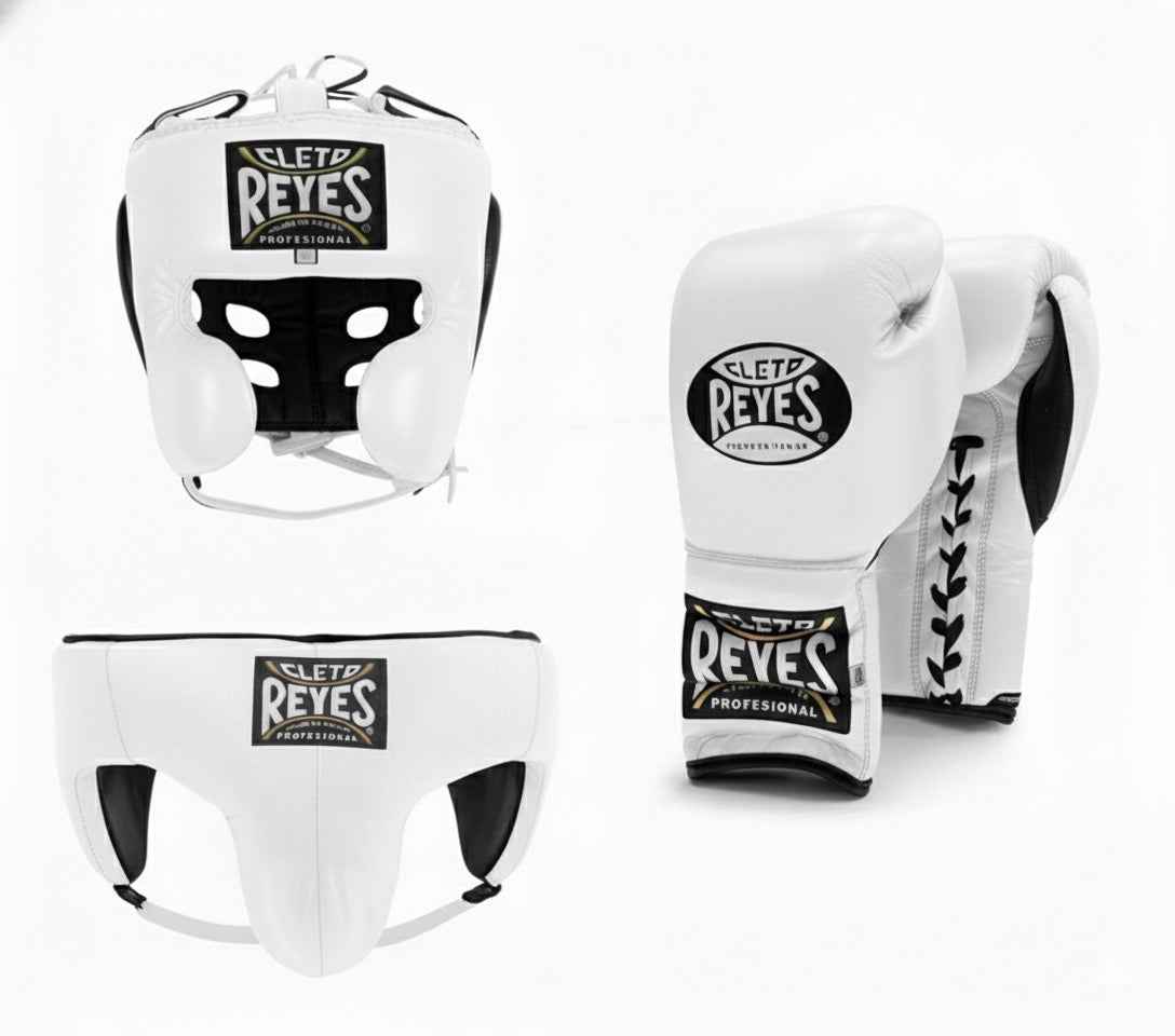 Official Cleto Reyes professional 3-piece boxing sparring gear set featuring matching lace-up gloves, a cheek protector headguard, and a groinguard in uniform classic white leather with black contrast linings.