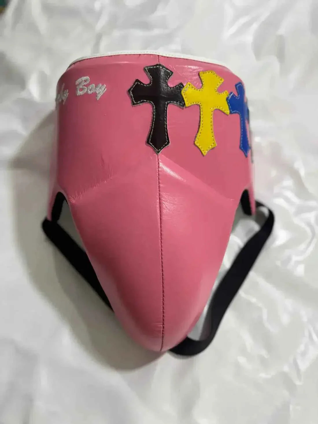 Custom Pink Winning CPS-500 professional groin protector handcrafted in Japan featuring hand-stitched multi-color cross patches.