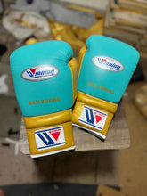 Custom Sky Blue and Gold Winning MS-600 professional lace-up boxing gloves handcrafted in Japan with official branding.