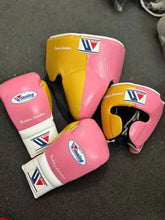 Winning MS-600 Custom Sparring Set in two-tone pink and yellow leather including lace-up gloves, headgear, and groin protector.