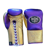 No Boxing No Life professional lace-up boxing gloves in metallic purple leather with a metallic gold thumb, palm, and cuff area featuring the official brand patch and contrasting white laces.