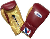 Custom Winning MS-600 professional 16oz lace-up boxing gloves in maroon leather with metallic gold palms and white laces, handcrafted in Japan.