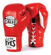 Official Cleto Reyes professional lace-up training boxing gloves in red leather featuring white laces, a white inner palm panel, and white printed brand logos.