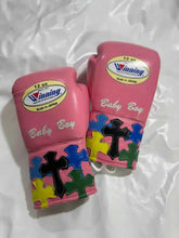 Winning MS-400 custom professional 12oz lace-up boxing gloves in pink leather featuring multi-color cross patches handcrafted in Japan.
