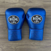 No Boxing No Life professional lace-up boxing gloves in full metallic royal blue leather featuring the official brand patch.