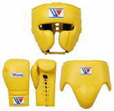Yellow boxing gear set including a headguard, boxing gloves, and a chinski guard, shown on a plain white background. The brand logo 'Venum' is visible on the chest protector and gloves.