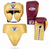 Boxing protective gear set including a gold boxing headguard, matching gold chest guard, maroon and gold boxing gloves, and a maroon and gold boxing glove shown from the back, all on a white background with the Winning brand logo.