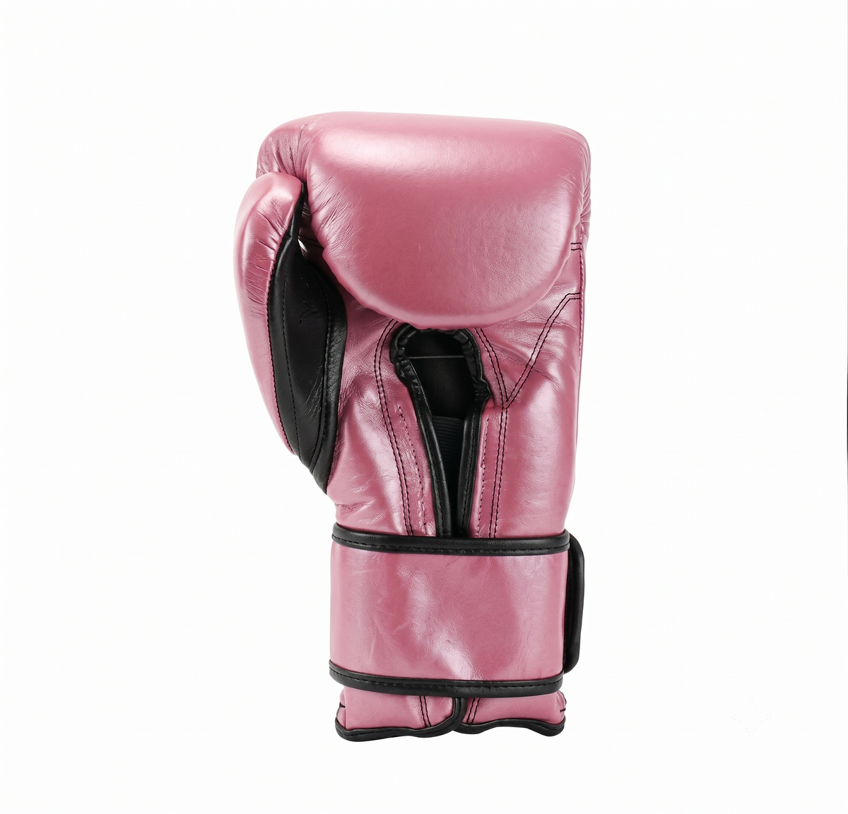 Cleto Reyes pink leather boxing glove with black trim shown from the side