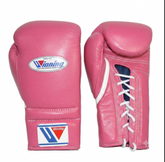 A pair of pink boxing gloves shown against a plain white background, displaying both the front and side views. The gloves feature white laces, a white and blue oval logo on the knuckle, and a matching logo patch on the wrist strap.