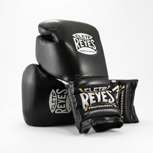 Cleto Reyes black boxing gloves pair with white and gold branding