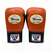 Authentic Orange and Black Winning professional boxing gloves handcrafted in Japan with premium leather.