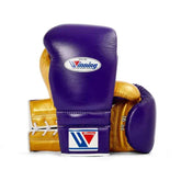 Authentic Winning MS-600 professional lace-up boxing gloves in purple and metallic gold premium leather.