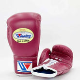 Authentic maroon Winning MS-300 professional lace-up boxing gloves handcrafted in Japan with official branding.