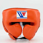 Authentic orange Winning FG-2900 professional boxing headgear with premium leather and lace-top closure.