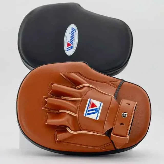 Authentic Winning CM-20 professional curved punch mitts in black and brown premium leather.