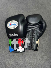Authentic Black Winning MS-300 professional lace-up boxing gloves with custom "Shadow" text and multi-colored cross patches.