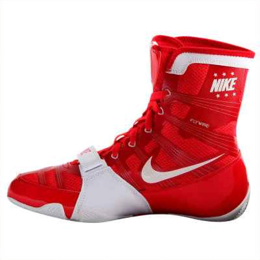 Side view of Nike Hyperko 1 red boxing boot displaying Flywire threads, white heel wrap, and midfoot strap