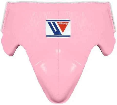 Custom Winning CPS-500 professional boxing groinguard in vibrant pink leather with official branding and anatomical hip protection.