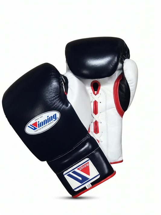 Side view of black, white and red Winning boxing gloves showing padding and cuff