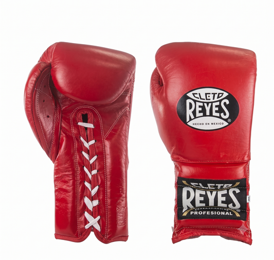Red and white lace-up leather boxing gloves illustrating lace-up glove closure style