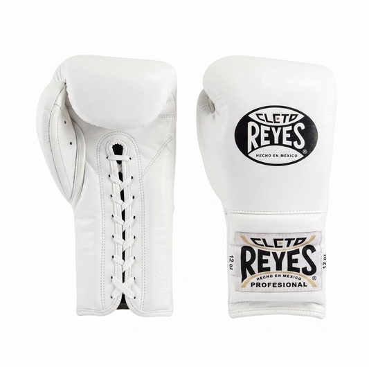 White and gold genuine leather boxing gloves illustrating how to break in new leather boxing gloves