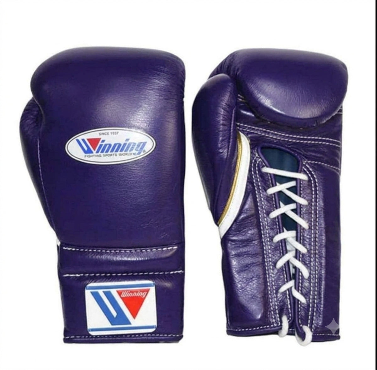 Winning purple lace-up boxing gloves showing the front logo and white laces