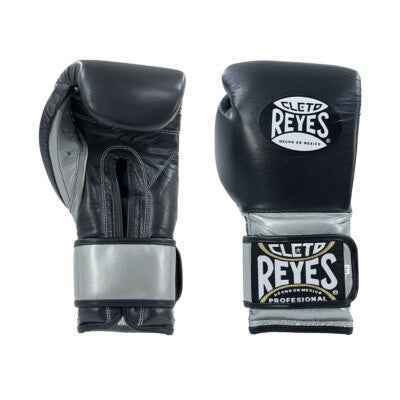Official Cleto Reyes professional hook-and-loop training boxing gloves in black leather featuring brilliant metallic silver leather cuffs with the traditional black and gold brand patches.