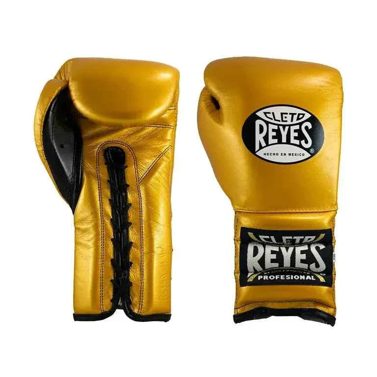 Official Cleto Reyes professional lace-up training boxing gloves in gold metallic leather featuring a black inner thumb panel, black laces, and traditional black and gold brand patches.