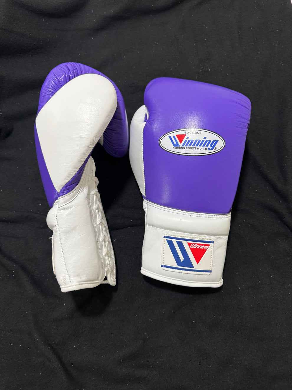 Custom Winning MS-600 professional lace-up boxing gloves in purple and white leather, handcrafted in Japan.