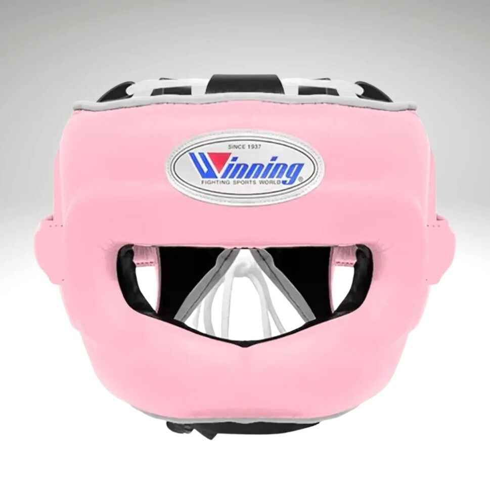 Winning professional custom 3-piece boxing sparring gear set featuring a matching lace-up glove pair, a face-bar headguard, and a groinguard in uniform pastel pink leather with white trim accents.