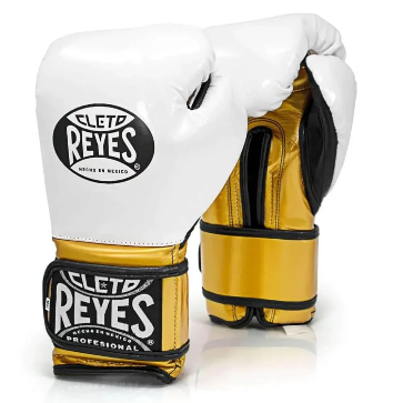 Official Cleto Reyes professional hook-and-loop training boxing gloves featuring a crisp white leather punching face with high-sheen gold metallic leather palms, thumbs, and wrist cuffs.