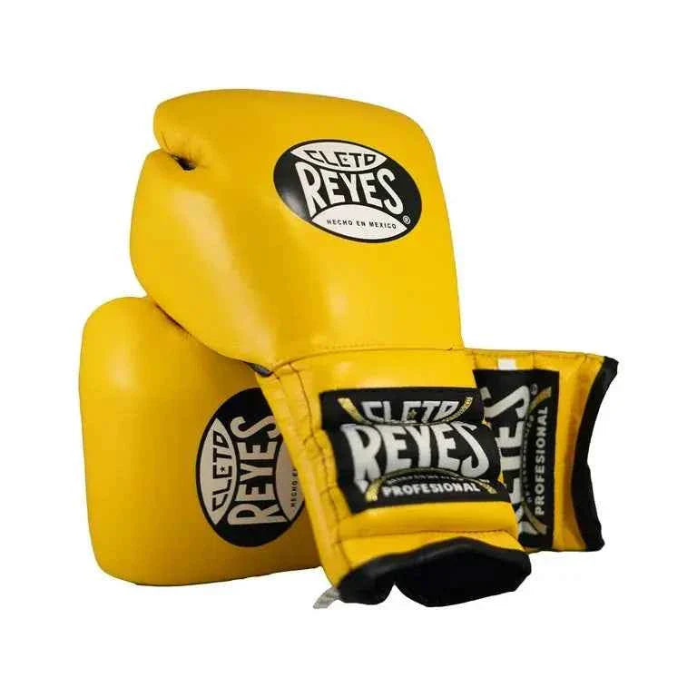 Official Cleto Reyes professional lace-up training boxing gloves in yellow leather featuring a black inner thumb panel, black laces, and the traditional white and black brand patches.