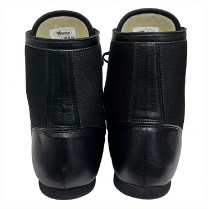 Pair of black Winning RS-100 boxing boots shown from the back featuring textured side panel and smooth leather heel cap