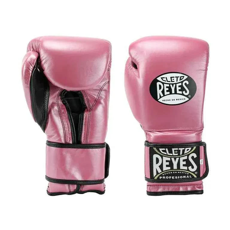 Official Cleto Reyes professional hook-and-loop training boxing gloves in pink metallic leather featuring a high-sheen magenta finish, black inner thumb lining, and traditional brand patches.