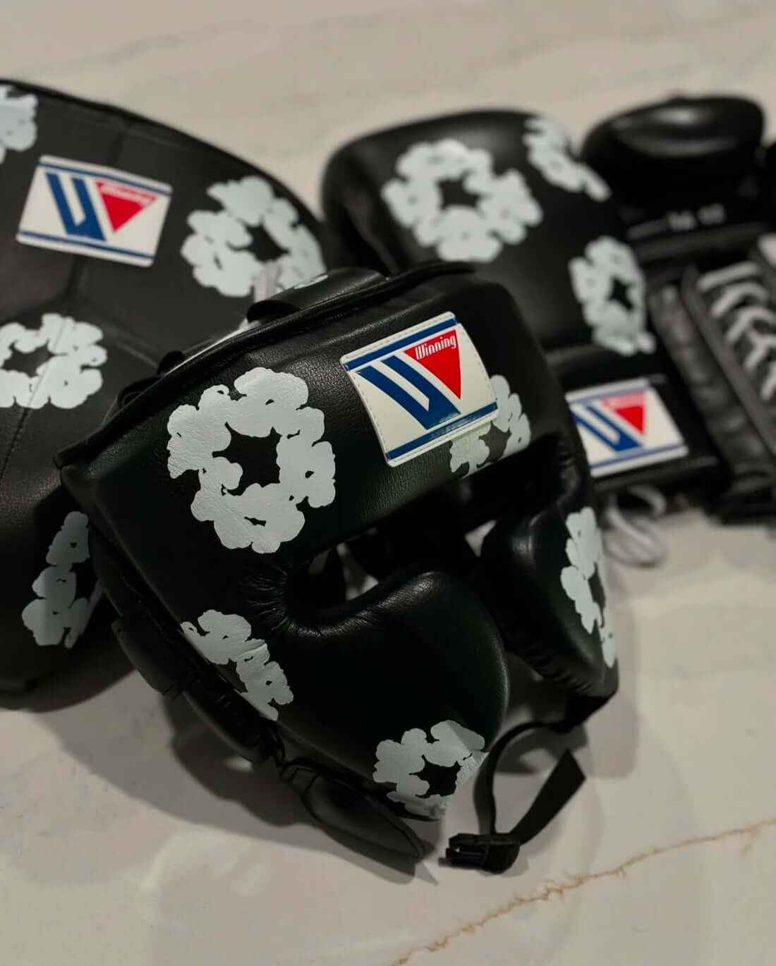 Winning MS-600 Custom Sparring Set in Black with White Floral Pattern including MS-600 gloves, FG-2900 headgear, and CPS-500 protector.