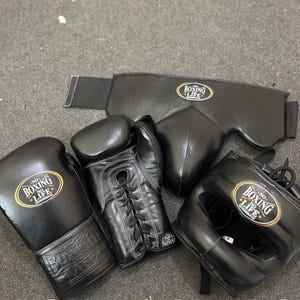 No Boxing No Life custom professional sparring set in matte black leather including lace-up gloves, headgear, and groin protector.