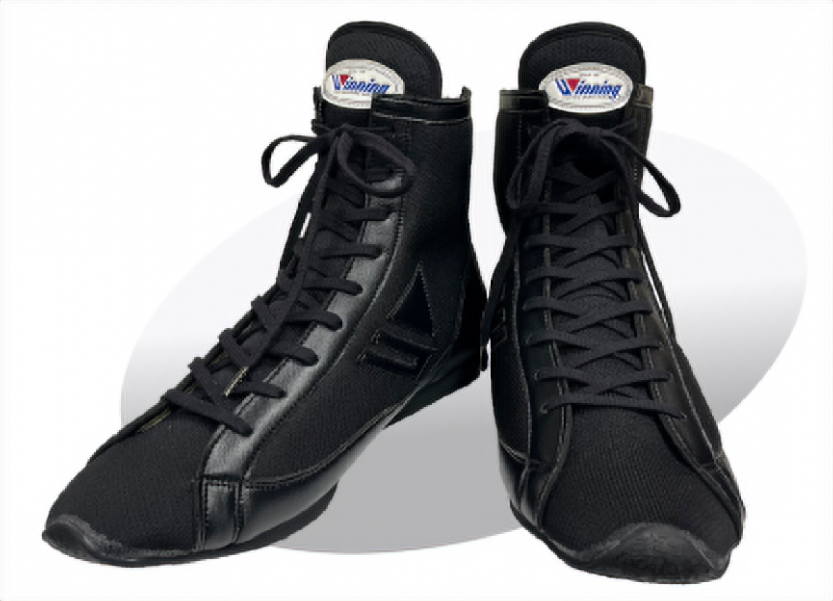 Pair of Winning RS-100 boxing shoes in sleek all-black colorway with high-top design and Winning logo on tongue