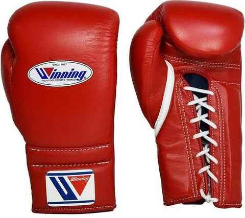 Official Winning professional lace-up training boxing gloves in premium red leather featuring white laces, a white contrast accent line, and the iconic brand logo crest on the cuffs.