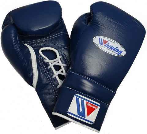 Official Winning professional lace-up training boxing gloves in premium navy blue leather featuring white laces, a white contrast palm accent line, and the iconic brand logo crest on the cuffs.