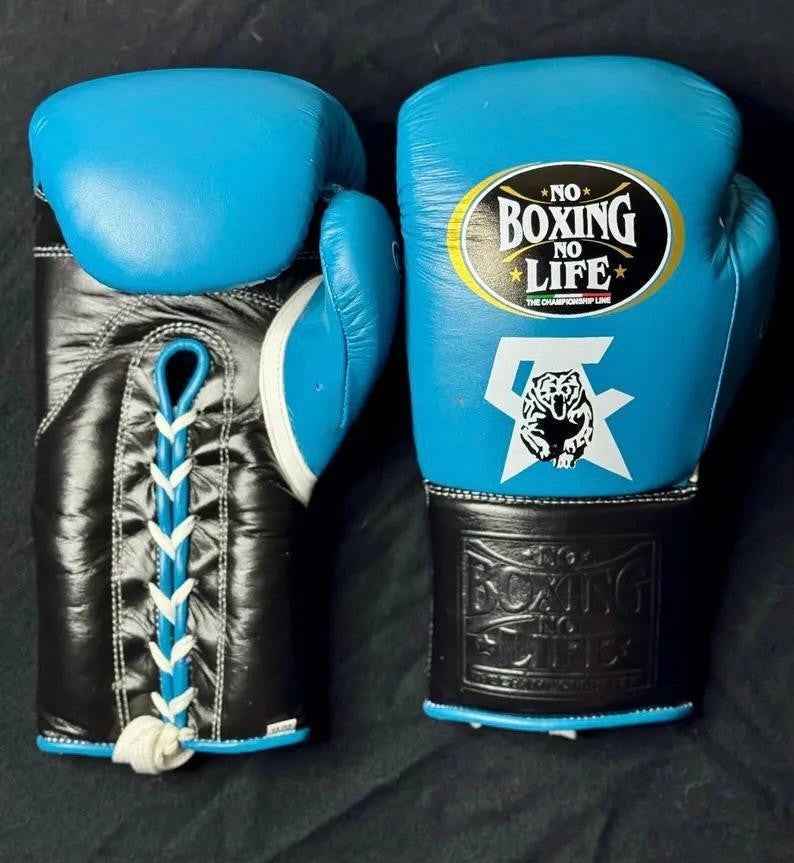 No Boxing No Life custom professional lace-up boxing gloves in sky blue leather with black palms and cuffs.