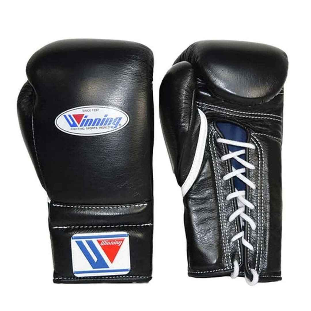 Official Winning professional lace-up training boxing gloves in premium black leather featuring white laces, a white contrast accent line, and the iconic brand logo crest on the cuffs.