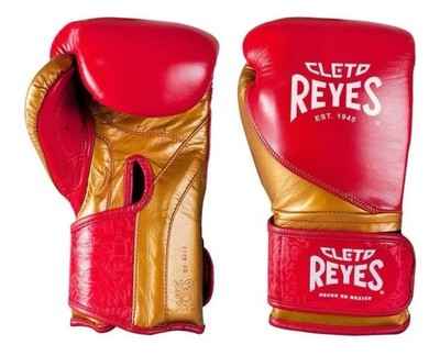 Special edition Cleto Reyes professional hook-and-loop training boxing gloves in red and gold leather featuring a printed heritage pattern on the wrist cuffs.