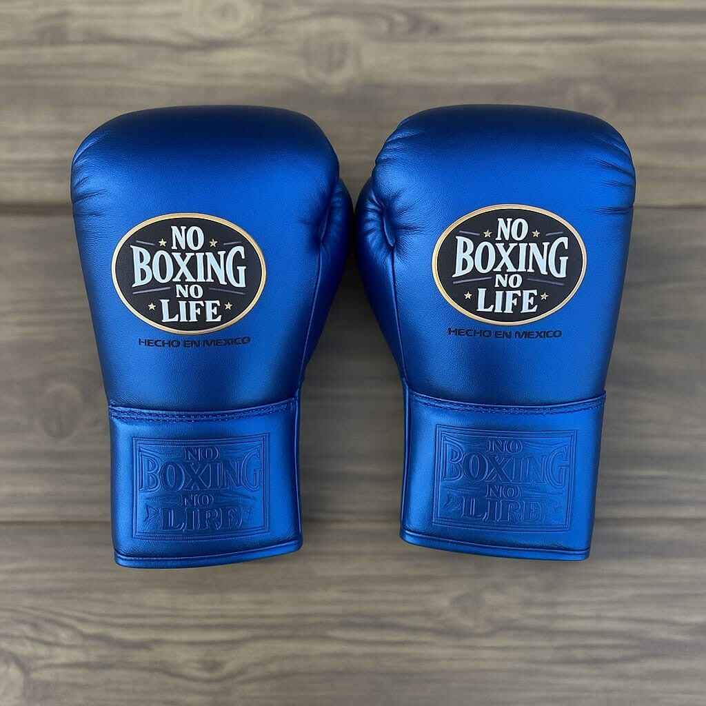 No Boxing No Life professional lace-up boxing gloves in full metallic royal blue leather featuring the official brand patch.