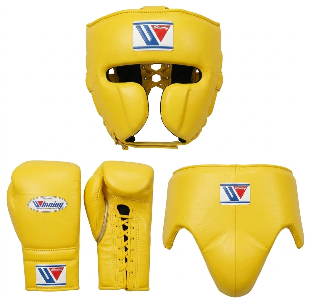 Yellow boxing gear set including a headguard, boxing gloves, and a chinski guard, shown on a plain white background. The brand logo 'Venum' is visible on the chest protector and gloves.