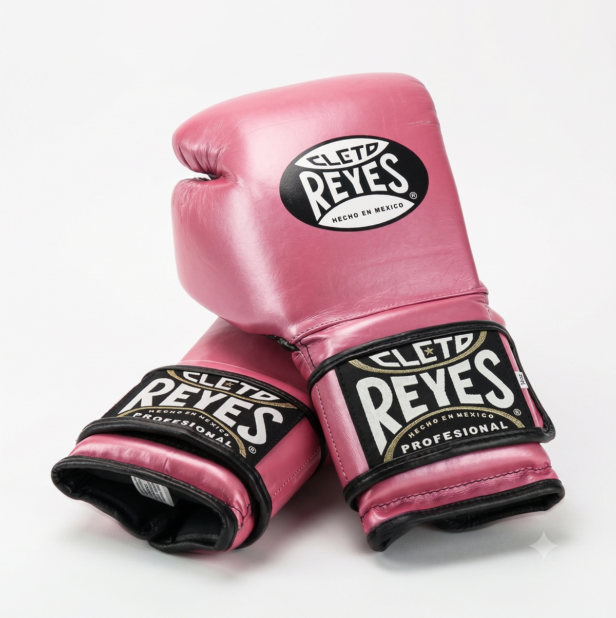 Cleto Reyes glossy pink boxing gloves pair with black and white brand patches