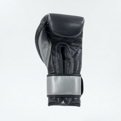 Cleto Reyes black leather boxing glove side view showing metallic silver cuff detail